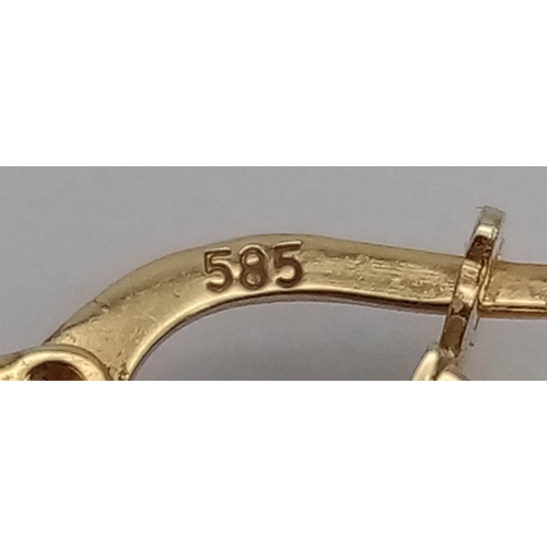 414 - A 14K Yellow Gold Pair Of Hoop Earrings. Screw decoration. 
4.2g total weight. Ref: 6-2488.