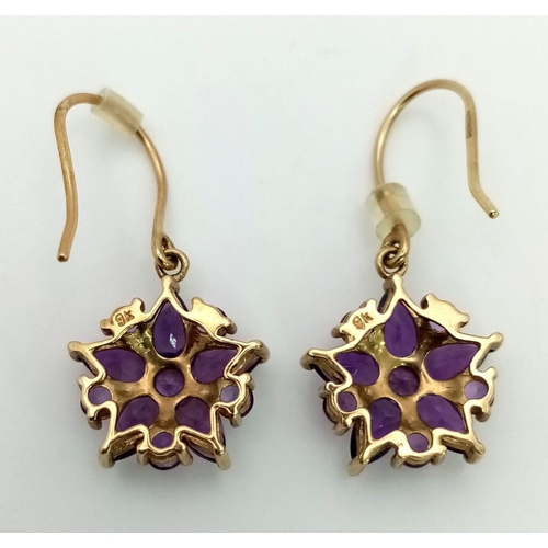 608 - 9K YELLOW GOLD AMETHYST SET FLOWER DROP EARRINGS 2.45G