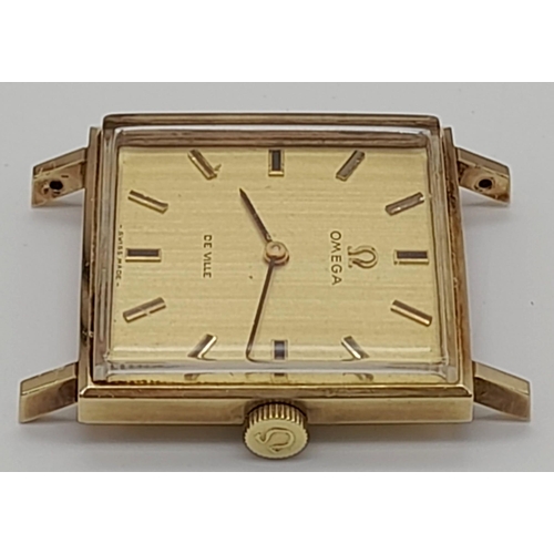 478 - A VINTAGE 9K GOLD OMEGA MANUAL MOVEMENT WATCH WITH SQUARE FACE 2 X 2cms APPROX, OVERWOUND.  A/F