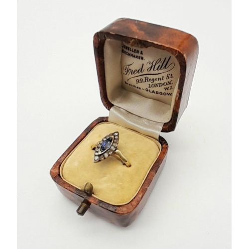 580 - An Edwardian 18K Gold Marquise Ceylon Sapphire and Diamond Ring. Size M. 2.17g total weight. Comes i... 