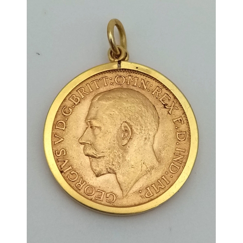 765 - A 22K Gold 1912 George V Sovereign - encased in 9k gold. 9.3g total weight.