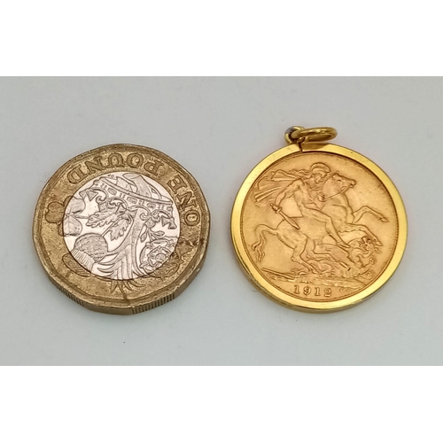 765 - A 22K Gold 1912 George V Sovereign - encased in 9k gold. 9.3g total weight.