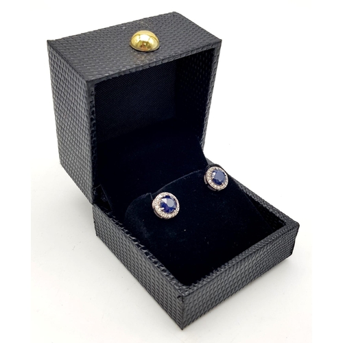 839 - 14K White Gold Blue Sapphire Earrings, 0.28cts Diamond, 2.15cts Blue Sapphire and a Total Weight 2.4... 