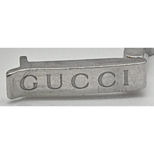 875 - A LADIES DIAMOND GUCCI LADIES WRIST WATCH WIRH SQUARE FACE IN STAINLESS STEEL. GOOD CONDITION  F.W.O... 