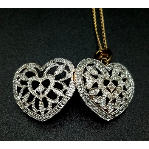 980 - An 18K Yellow Gold and Diamond Heart Locket on a 9K Yellow Gold Disappearing Necklace. 2.5 and 40cm.... 