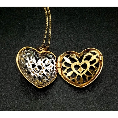 980 - An 18K Yellow Gold and Diamond Heart Locket on a 9K Yellow Gold Disappearing Necklace. 2.5 and 40cm.... 