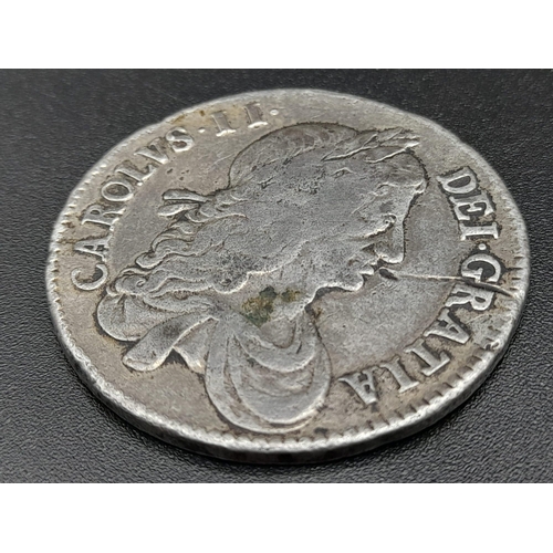 951 - A Charles II 1663 Silver Half Crown Coin. S3361. Please see photos for conditions.