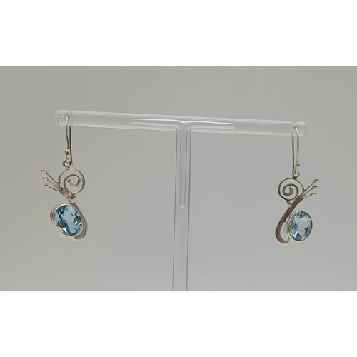 966 - Blue Topaz Silver Earrings. 925 Sterling silver. 5 Ct. 5g total weight.