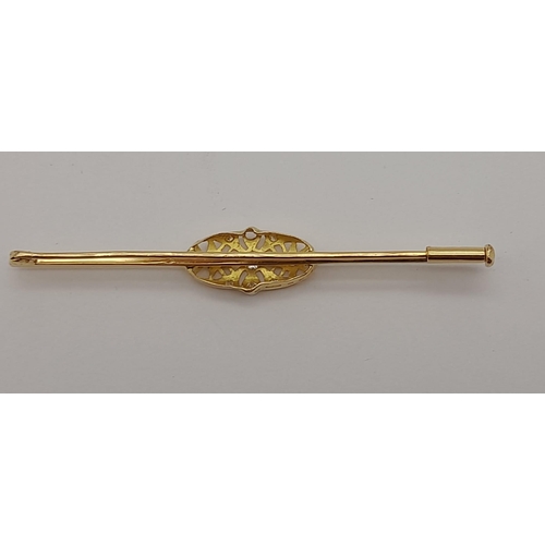 986 - AN ANTIQUE 18K GOLD AND DIAMOND BAR BROOCH IN ART DECO STYLE .  4.7gms