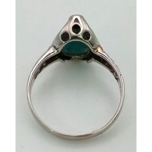 1007 - A Vintage 18K White Gold Turquoise Ring. Size N. 2.56g total weight.