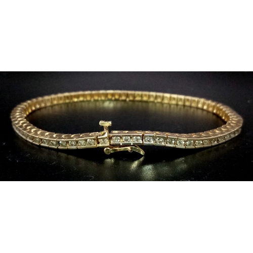 11 - 14K YELLOW GOLD DIAMOND SET TENNIS BRACELET 2.10CT 15.1G WITH SAFETY CATCH FITTING ALSO 20CM IN LENG... 