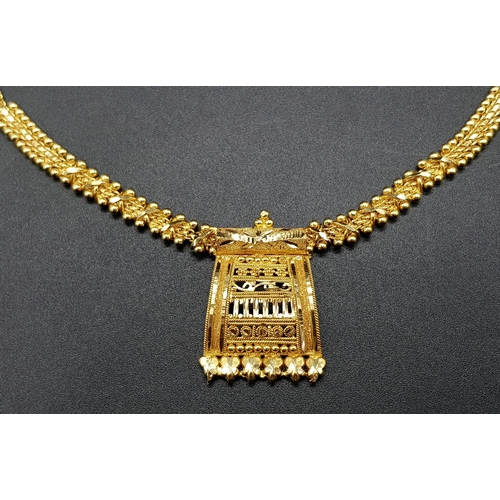 149 - An Asian-Themed 22K Yellow Gold Necklace. 44cm. 15.8g. Ref: 6-1513.