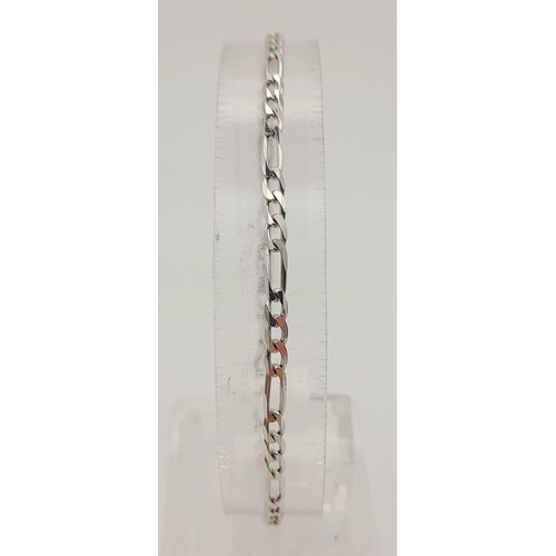 218 - An 18K White Gold Figaro Link Bracelet. 19cm. 3.64g. Ref: 5-730.