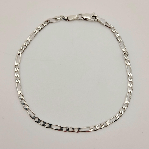 218 - An 18K White Gold Figaro Link Bracelet. 19cm. 3.64g. Ref: 5-730.