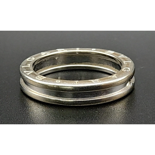 255 - A BULGARI 18K WHITE GOLD GENTS RING.  8.2gms    size S