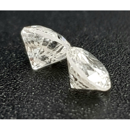 384 - PAIR OF ROUND BRILIANT CUT DIAMONDS 0.47CT TOTAL