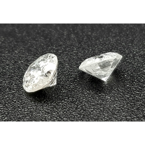 601 - PAIR OF ROUND BRILIANT CUT DIAMONDS 0.41CT TOTAL