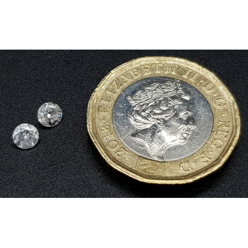 601 - PAIR OF ROUND BRILIANT CUT DIAMONDS 0.41CT TOTAL