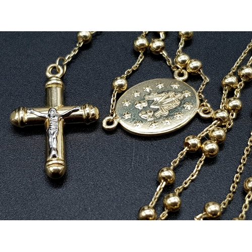 664 - A 14K Yellow Gold Ball-link Chain with a 14K Yellow and White Gold Crucifix Pendant. Plus, a 14K Whi... 