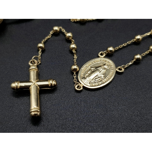 664 - A 14K Yellow Gold Ball-link Chain with a 14K Yellow and White Gold Crucifix Pendant. Plus, a 14K Whi... 