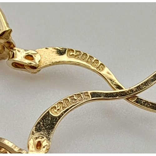 734 - A 14K Gold Lot to Include: Two pairs of earrings, a heart ring - size O and a necklace with Pisces p... 