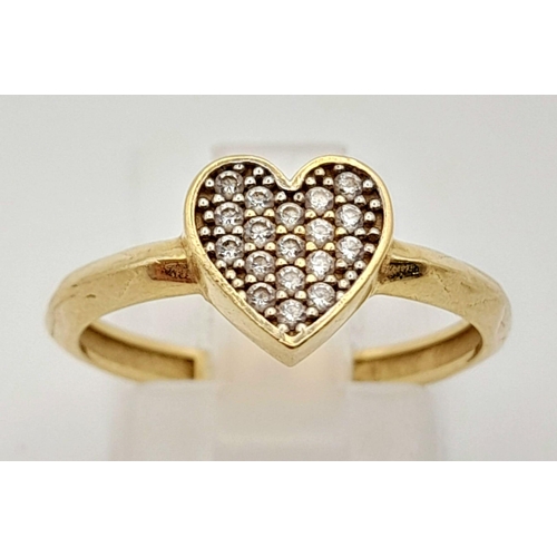 734 - A 14K Gold Lot to Include: Two pairs of earrings, a heart ring - size O and a necklace with Pisces p... 