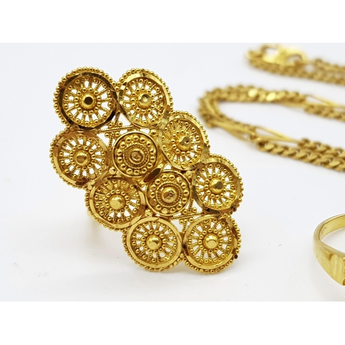 521 - Two 22K Gold Rings - Sizes L and N. Plus, a 22k Gold necklace with cupid pendant. 17.6g total weight... 