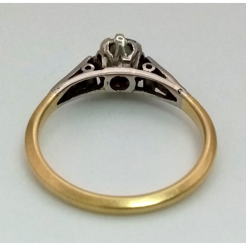 307 - A 9K Yellow Gold Diamond Ring. Central oval diamond with a further compliment of three diamonds on e... 