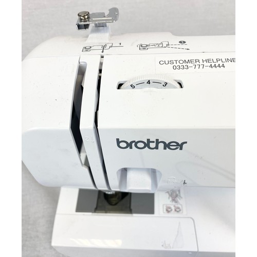 1175 - A Brother AE 1700 Sewing Machine with Footpad.
In good condition - In working order.