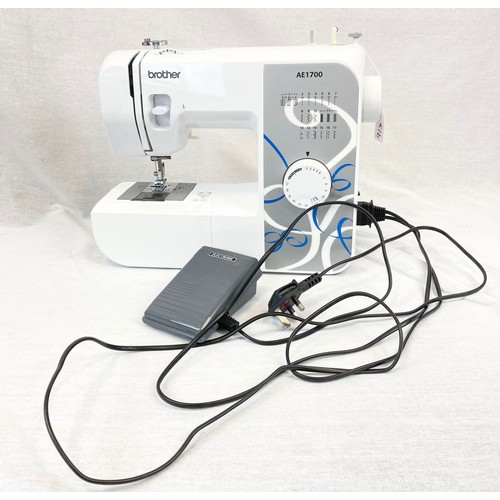 1175 - A Brother AE 1700 Sewing Machine with Footpad.
In good condition - In working order.