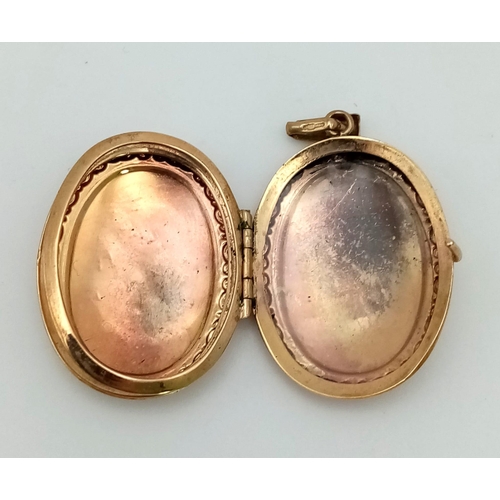 13 - A Vintage 9K Yellow Gold Oval Locket. 3cm. 3.62g