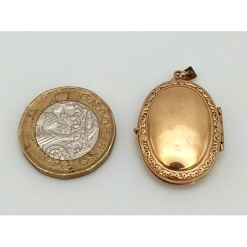 13 - A Vintage 9K Yellow Gold Oval Locket. 3cm. 3.62g