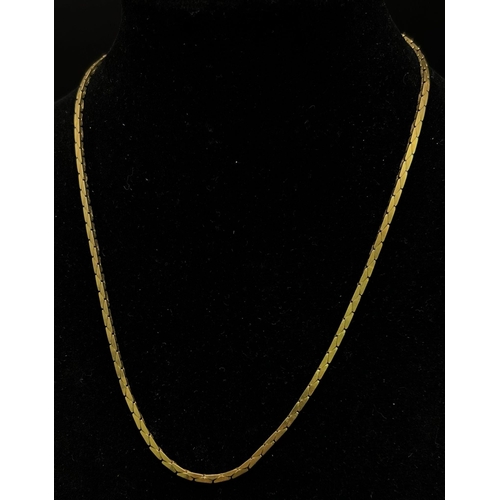 17 - A Vintage 9K Yellow Gold Snakeskin-Link Necklace. 38cm.
8.48g