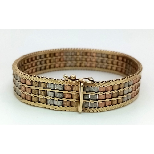 2 - A Vintage 9K Three Colour Gold Bracelet. Rose, white and yellow gold in a three row geometric patter... 