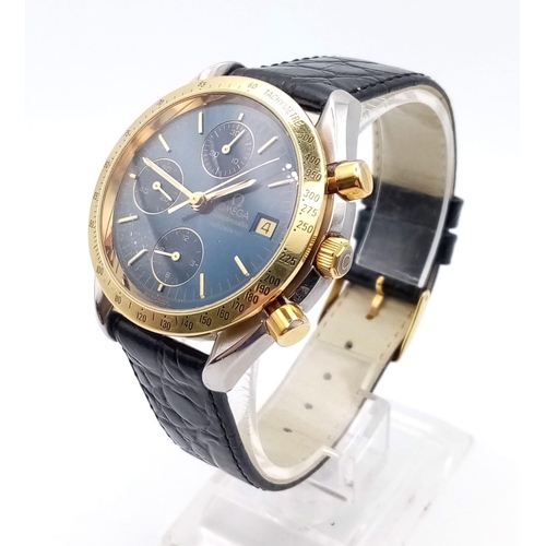 307 - AN OMEGA SPEEDMASTER AUTOMATIC CHRONOGRAPH WITH GOLDEN BEZEL AND STUNNING BLUE DIAL, 3 SUBDIALS AND ... 