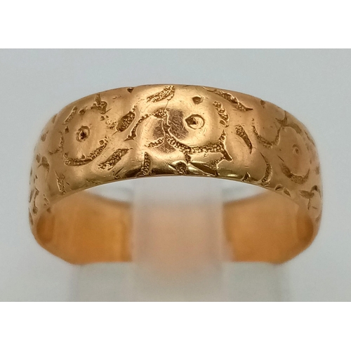 38 - A Vintage 18K Yellow Gold Engraved Band Ring. Size N. 4.33g