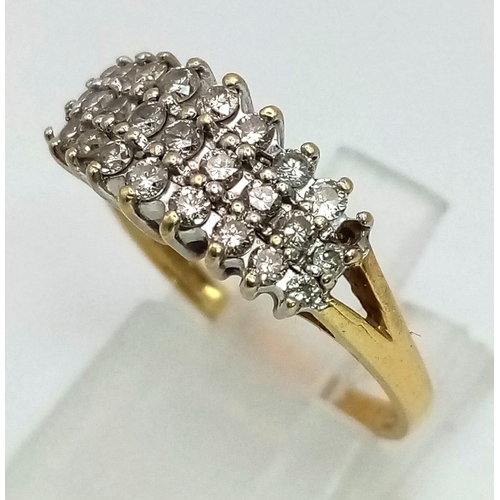 51 - An 18K Yellow Gold Three-Row Diamond Ring. Three rows of brilliant round cut diamonds. Two missing s... 