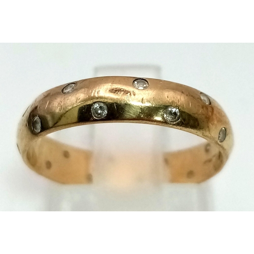 524 - A Vintage 9K Yellow Gold Diamond Band Ring. 0.2ct diamonds in a two row formation. Size L. 1.96g tot... 