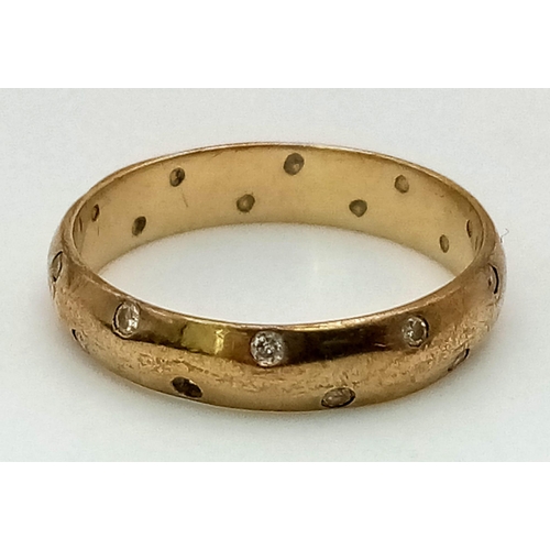 524 - A Vintage 9K Yellow Gold Diamond Band Ring. 0.2ct diamonds in a two row formation. Size L. 1.96g tot... 