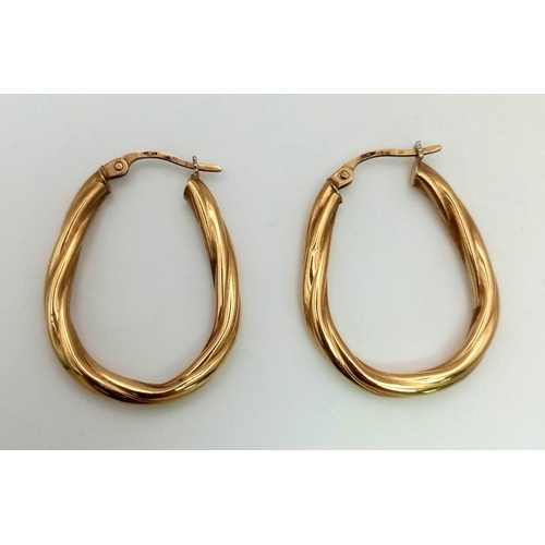 624 - A Vintage Pair of 9K Yellow Gold Hoop Earrings. 1.55g total weight.