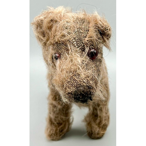 659 - Small Vintage Stuffed Toy Dog by Merrythought. Complete with original red collar and label sewn to u... 