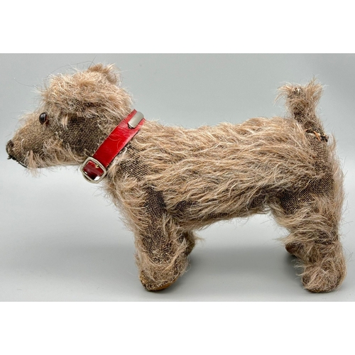 659 - Small Vintage Stuffed Toy Dog by Merrythought. Complete with original red collar and label sewn to u... 