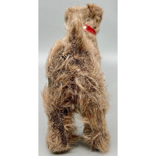 659 - Small Vintage Stuffed Toy Dog by Merrythought. Complete with original red collar and label sewn to u... 