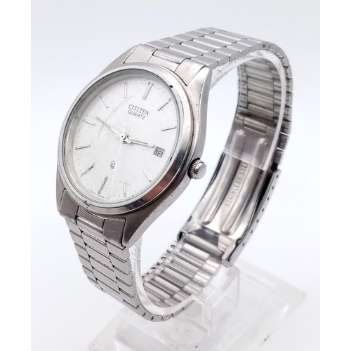 728 - A CITIZEN QUARTZ STAINLESS STEEL WATCH,  35mm