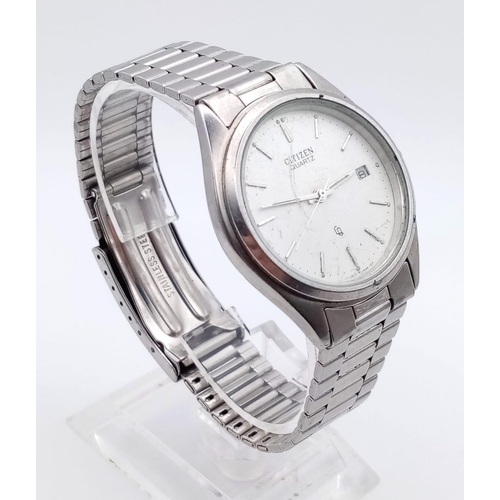 728 - A CITIZEN QUARTZ STAINLESS STEEL WATCH,  35mm