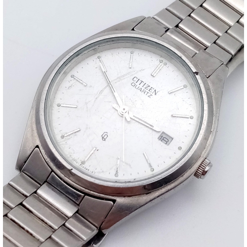 728 - A CITIZEN QUARTZ STAINLESS STEEL WATCH,  35mm