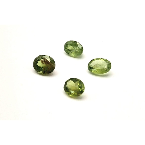 1008 - A lot of 4 Natural Peridot Gemstones. 13.10cts in total.