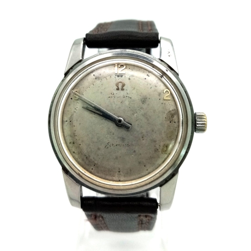 1097 - A VINTAGE OMEGA SEAMASTER , MANUAL MOVEMENT GOOD WORKING ORDER ... NEEDS A LITTLE TLC.