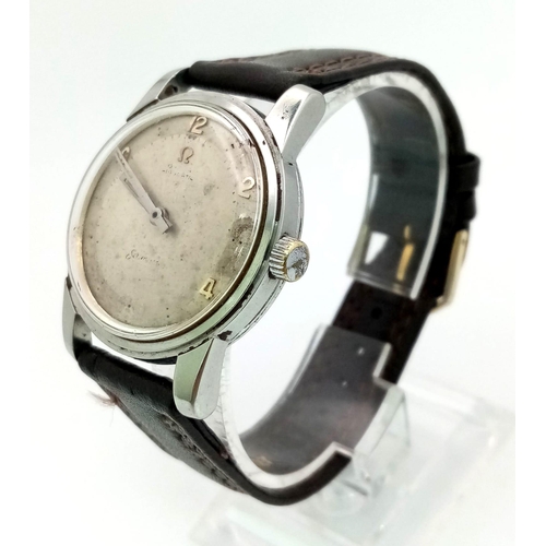 1097 - A VINTAGE OMEGA SEAMASTER , MANUAL MOVEMENT GOOD WORKING ORDER ... NEEDS A LITTLE TLC.