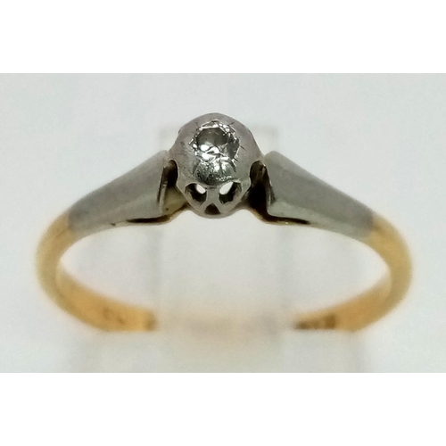 603 - An Antique 18K, Platinum and Diamond Solitaire Ring. Size J/K. 1.7g total weight.